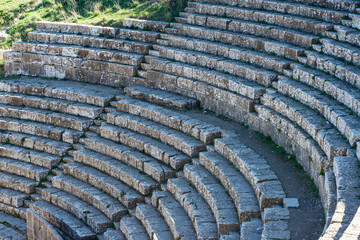 Roman theater steps of the ancient Roman town of Djemila in Setif, Algeria. UNESCO World Heritage Site.