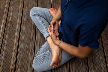 Woman practising meditation in western France