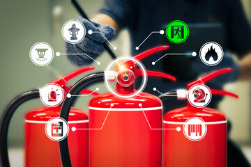Fire extinguisher has engineer checking with fire protection icons symbol to prepare fire equipment for prevention in emergency case and safety or rescue and alarm system training concept.