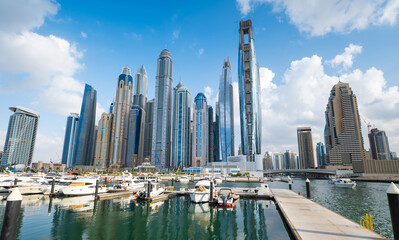 Fototapeta na wymiar Dubai marina harbor on a sunny day in the UAE