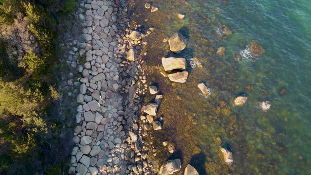 4K Rising drone shot of the Rocky Seacoast at Nobska Point in Cape Cod, Massachusetts