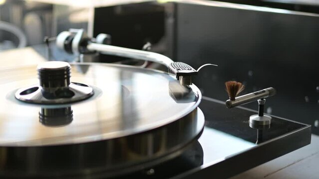 Placing the record holder on a high-end vintage turntable
