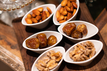 Traditional arabic sweets. Dates and almond is served for holiday. Ramadan - Kareem, family, food, festive