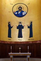 Naklejka premium Saint George maronite cathedral, Beirut, Lebanon. Chancel altar and frescoes depicting Pantocrator Christ above maronite saints Rafqa, Charbel et Hardini