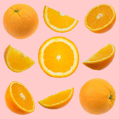 Set of fresh whole and cut orange and slices isolated on pink background. From top view.
