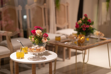 Beautiful tables served for a dinner with flowers, interior, festive, holidays, celebration, restaurant