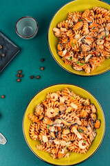 Pasta with mussels and shrimp.