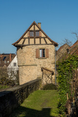 Fototapeta na wymiar Old tower of the city wall in the german village called Dettelbach
