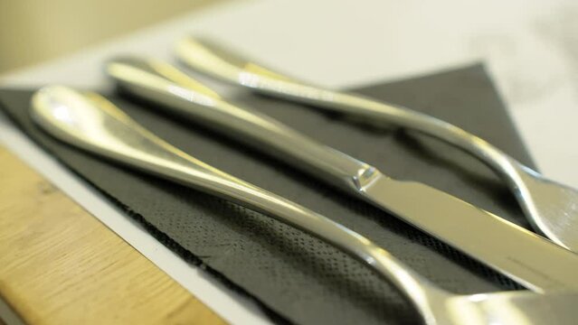 Close Up Of Cutlery On Table In Restaurant