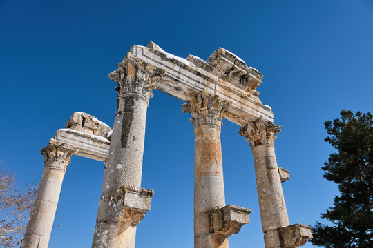 Low Angle Shot Of Ceremonial Gate (Pillars) at Uzuncaburc (Diocaesarea) , Mersin - Turkey
