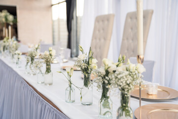 Wedding table decoration for the bride and groom and the party