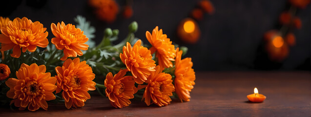 Funeral saffron chrysanthemum with copy space. Warm saffron chrysanthemum on a deep orange background with space for text. - obrazy, fototapety, plakaty