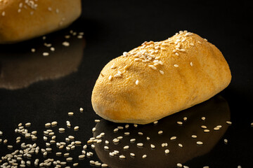 The cake looks like a bun with sesame seeds. Body cake: three types of chocolate, sesame praline, gel with cocoa  powder, salted caramel, crispy chocolate layer. Balanced chocolate taste.