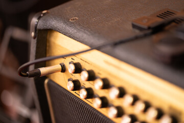 Guitar amplifier on bokeh light colored background, classic vintage rock sound. DSL20c tube amp