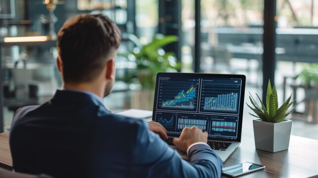 Businessman or accountant working on laptop computer