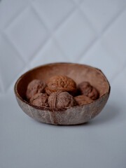Walnuts in a coconut bowl