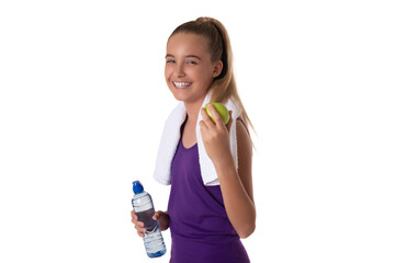 Healthy lifestyle - fitness girl eating apple smiling happy looking at camera and holding a water bottle. Pretty Caucasian woman isolated