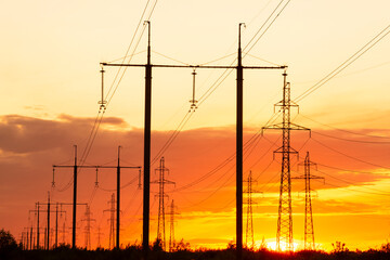 Power line silhouettes at sunset - 727124472
