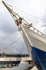 Fototapeta na wymiar Old Wooden Trading Boats at Port of Sunda Kelapa or PSK in north Jakarta, Indonesia.