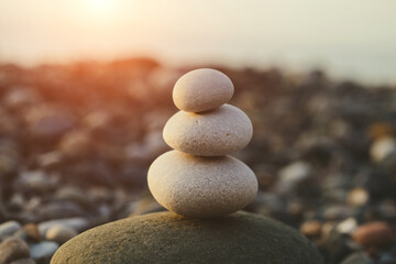 Pyramid of pebbles on the beach, zen, harmony and meditation