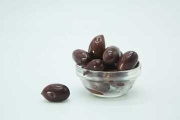 Pickled large olives. The product is ready to use. White background.