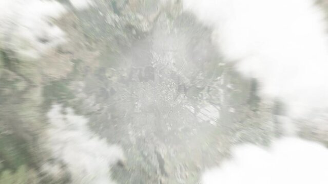 Earth zoom in from space to Canberra, Australia. Followed by zoom out through clouds and atmosphere into space. Satellite view. Travel intro. Images from NASA