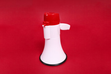 Happy Chinese new year. Hand of Asian Chinese senior man holding a Megaphone on pink background, Festival, Traditional, Culture, Announment.