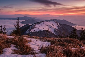 Winter mountain landscape in Mala Fatra at winter from on hill peek  Stoh peak at sunrise, Osnica, Slovakia. Discover the beautiful winter nature