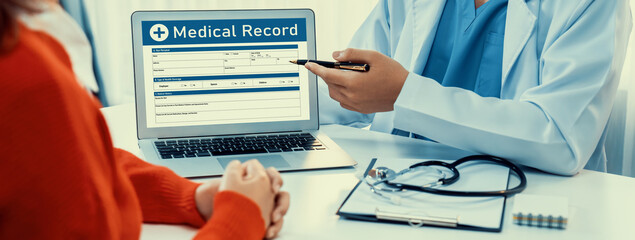 Laptop display medical report or diagnostic result of patient health on blurred background of doctor's appointment in hospital. Medical consultation and healthcare treatment. Panorama Rigid - obrazy, fototapety, plakaty