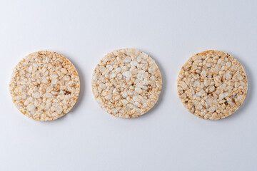 Pile of three rice cakes on white backdrop. Food background.