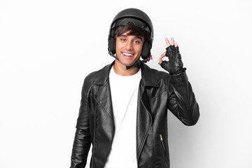 Young man with a motorcycle helmet isolated on white background showing ok sign with fingers