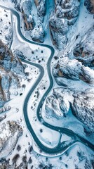 Aerial view of the winding Snake Road in winter in the Dolomite Alps of Italy