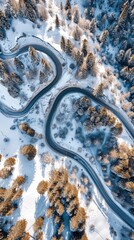 Aerial view of the winding Snake Road in winter in the Dolomite Alps of Italy