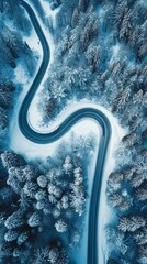 Aerial view of the winding Snake Road in winter in the Dolomite Alps of Italy