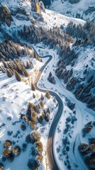 Aerial view of the winding Snake Road in winter in the Dolomite Alps of Italy