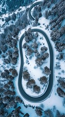 Aerial view of the winding Snake Road in winter in the Dolomite Alps of Italy