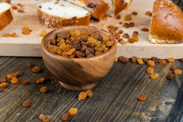 sweet bun with golden raisins, closeup