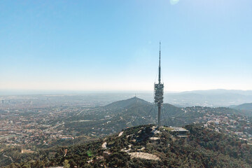 Obraz premium View from Tibidabo on landscape with tv tower in Barcelona, Spain.