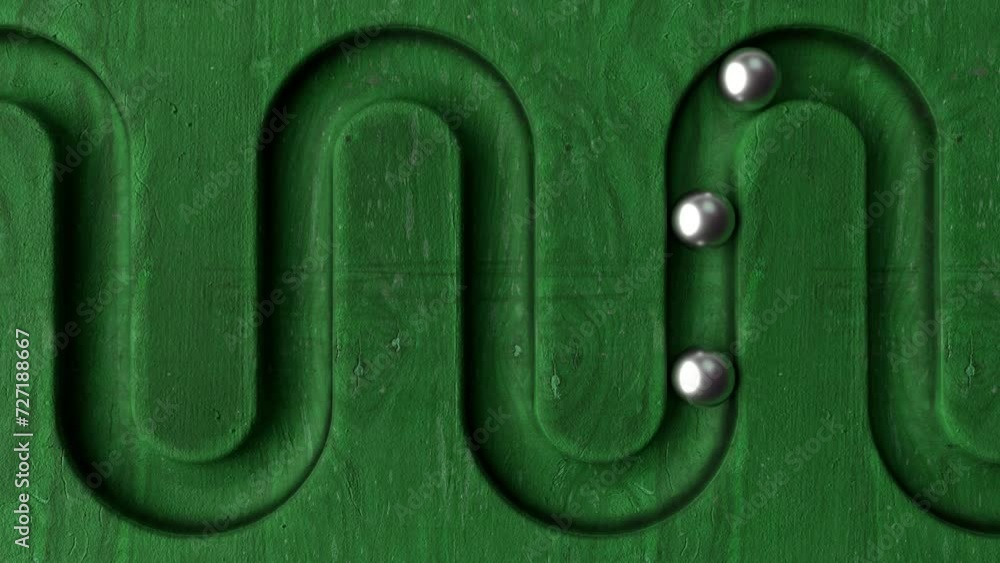 Aufkleber metal balls rolling in geometry deepening on green wooden background. abstract cycled minimal animat