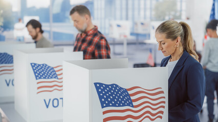People Exercising Their Civic Duty, Visiting a Modern Polling Place, Using a Ballot to Vote for an...