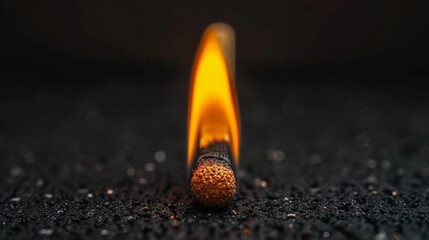 burning match on black