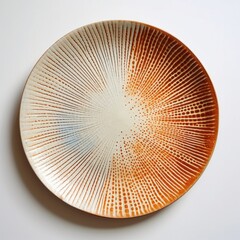 Decorative ceramic painted plate, handmade, isolated, closeup top view.