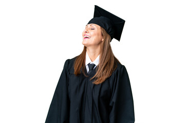 Middle age university graduate woman over isolated background laughing in lateral position