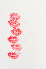 red chalk pastel rubbing or impression of lips on blank paper