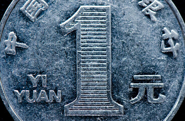 Money.  Chinese coin One Yuan, close up