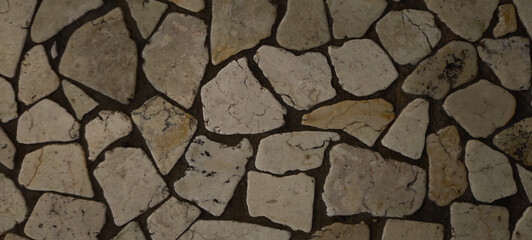 MAKASSAR, INDONESIA Asia, January 15 2024 background of stone fragments stuck to the floor