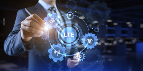 LTE Wireless mobile internet concept. Businessman pressing virtual button.