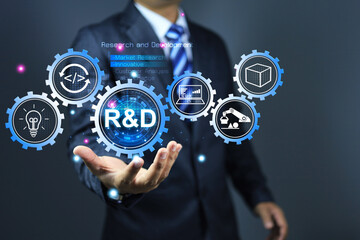 Research and development concept with businessman holding r and d gear system process to continue product improvement and development from start to finish products