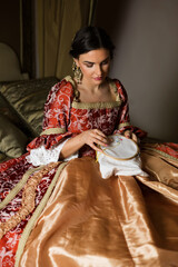 Renaissance woman with her embroidery work