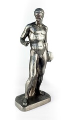 A purchased (widely used) figurine of an ancient discobolus made of aluminum iron in close-up on a white background